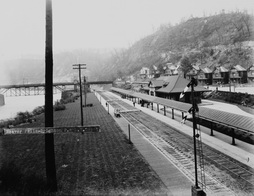 Beaver Falls - Brighton P. & L. E. Depot, with walking bridge. 1853