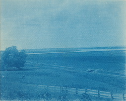 Untitled (left section of a panoramic view with fence and railroad in foreground)