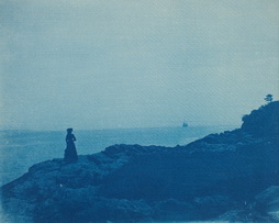 Woman Watching Schooner from a Rocky Promontory