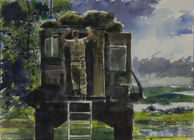 Soldier on Back of Truck