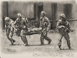 A stretcher team removes a casualty...