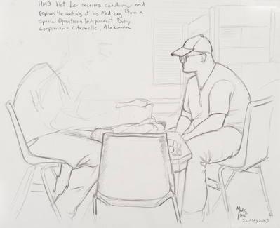 HM3 Viet Le receives coaching