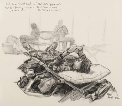 Lcple John Howard reads a 