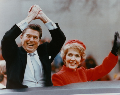 President and Mrs. Reagan wave during Inaugural Parade, January 20, 1981
